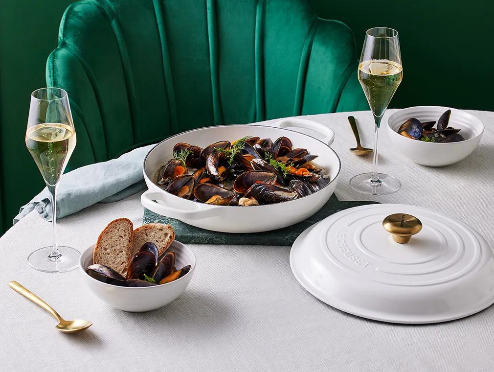 Mousserende vin og hvidløgs muslinger